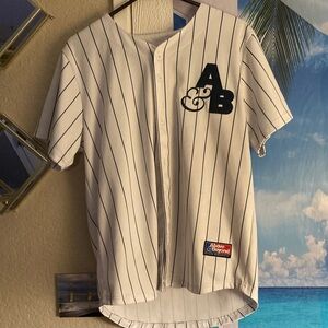 Above and Beyond Striped Baseball Jersey with A&B Patch size M